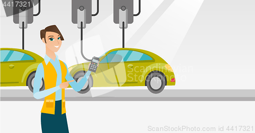 Image of Worker controlling automated assembly line for car