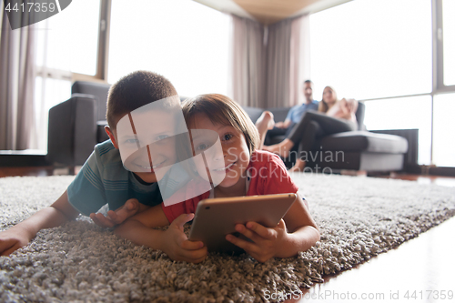 Image of couple spending time with kids