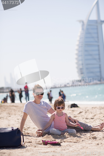 Image of Mom and daughter on the beach