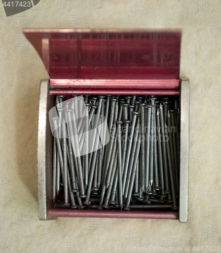 Image of small box with nails