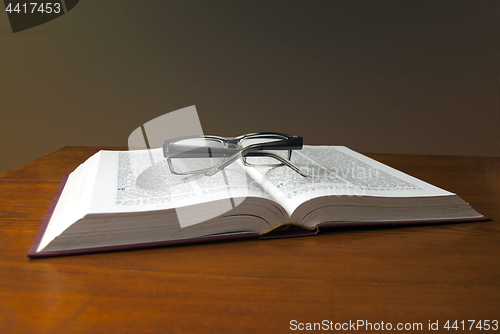 Image of open book on the table