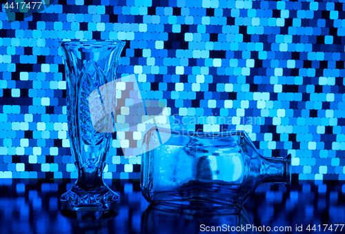 Image of vase and a bottle of glass