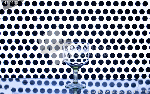 Image of Glass wine glass on a background of circles