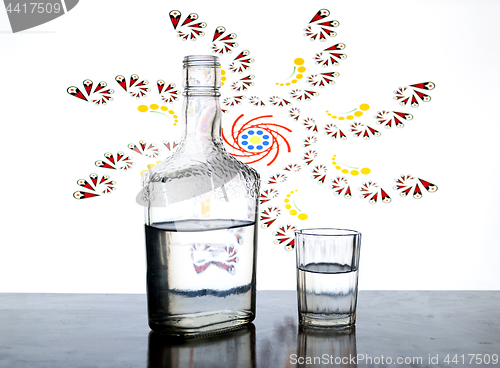 Image of transparent glass bottle of vodka