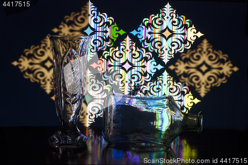 Image of transparent vase and a bottle of glass