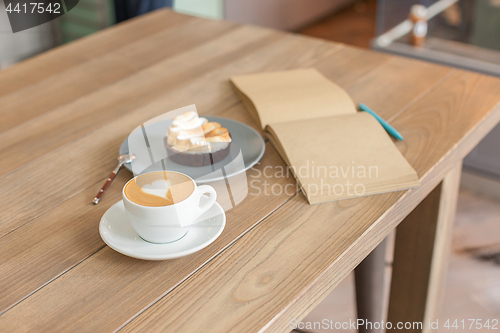 Image of A table setting for coffee on the counter at a coffee house