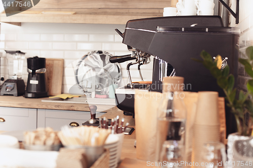 Image of A table setting for coffee on the counter at a coffee house