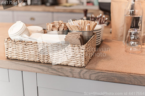 Image of A table setting for coffee on the counter at a coffee house