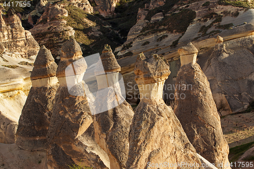 Image of Fairy houses stone cliffs