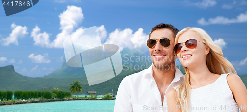 Image of happy couple on over bora bora background