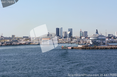 Image of Ferries docked in the Port of Tallinn, cityscape beyond