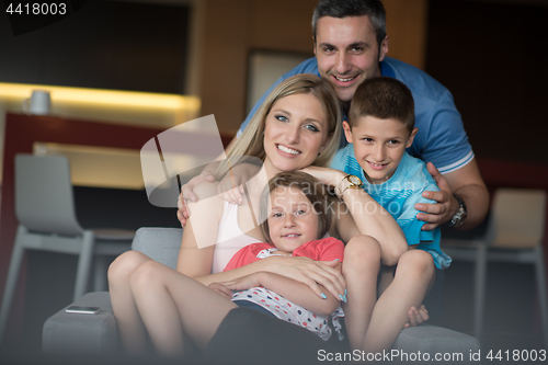 Image of couple spending time with kids