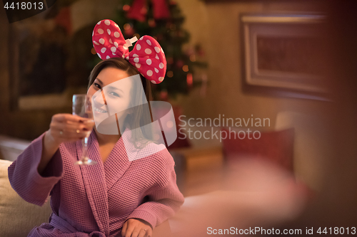 Image of woman drinking champagne at spa