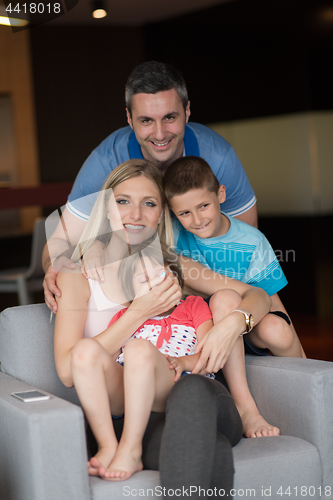 Image of couple spending time with kids
