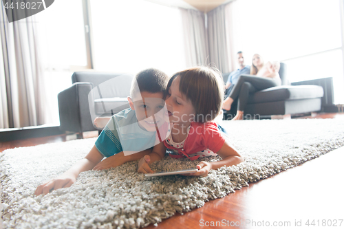 Image of couple spending time with kids