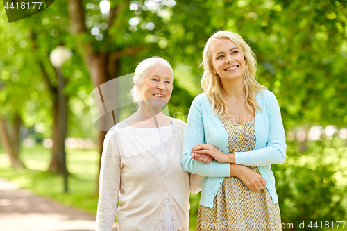 Image of daughter with senior mother at park