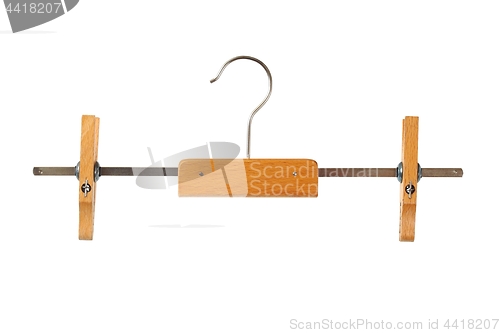 Image of Wooden clothes hanger on white