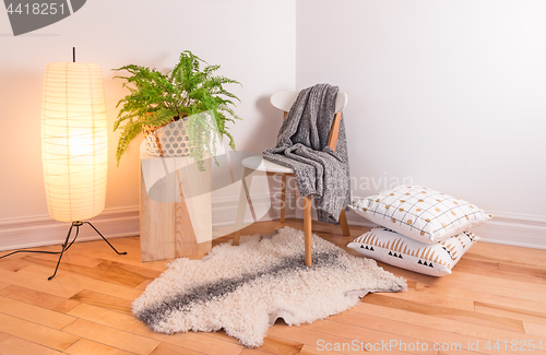 Image of Room with cozy light decorated in Scandinavian style