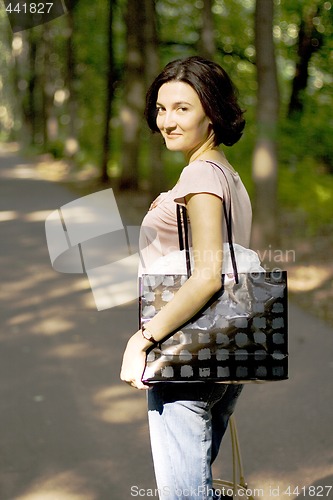 Image of woman with shopping bag