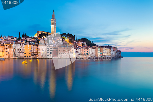 Image of Colorful sunset of Rovinj town, Croatian fishing port on the west coast of the Istrian peninsula.