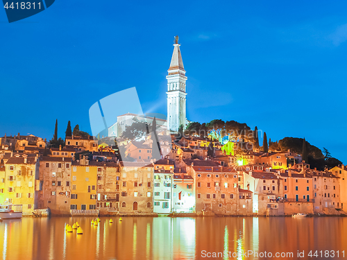 Image of Colorful sunset of Rovinj town, Croatian fishing port on the west coast of the Istrian peninsula.