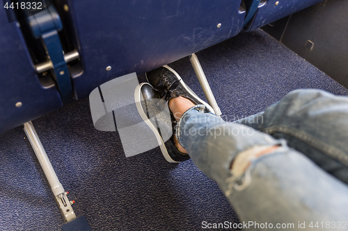 Image of Airplane seats with more leg space for comfortable flight.