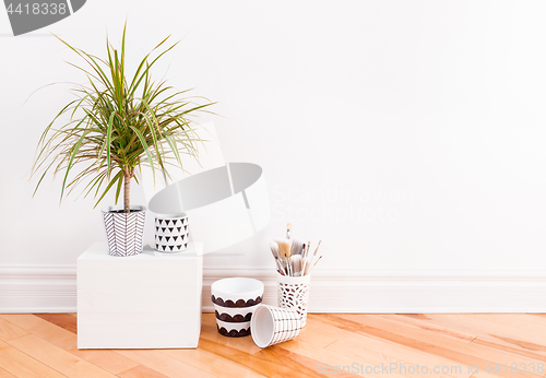 Image of Little palm tree and hand-painted ceramic pots