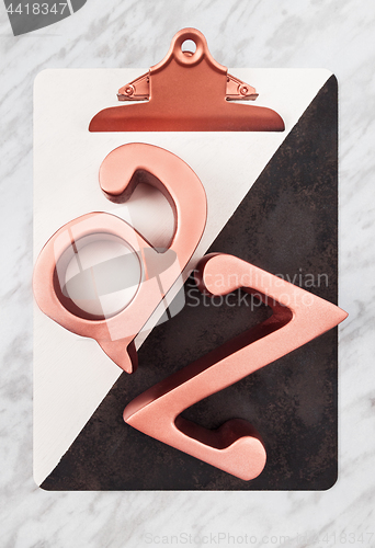 Image of Stylish clipboard with metal rose gold letters