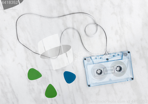 Image of Blue audio tape and guitar picks