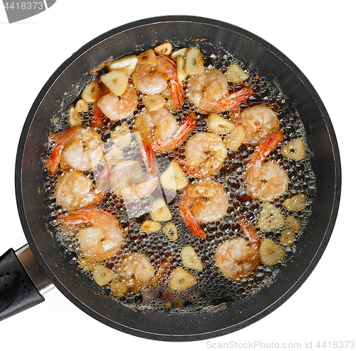 Image of frying garlic prawns