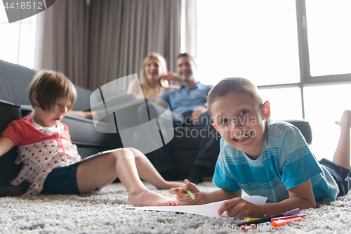 Image of young couple spending time with kids