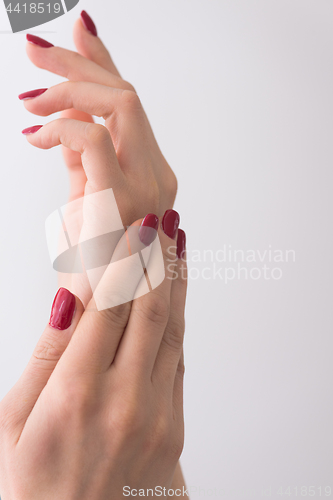 Image of closeup of hands of a young woman