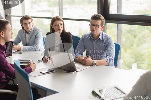 Image of Business Team At A Meeting at modern office building