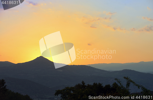 Image of Nice sunset over mountains