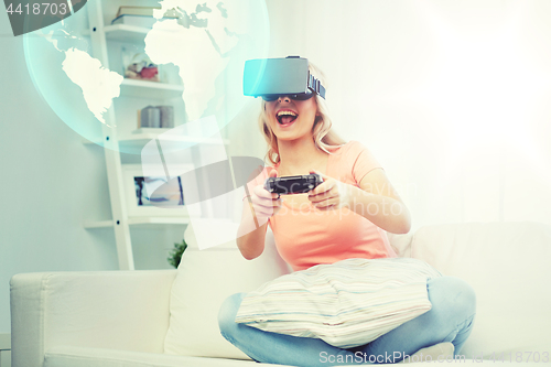 Image of woman in virtual reality headset with controller