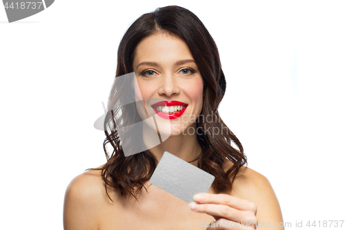 Image of beautiful woman with red lipstick and credit card
