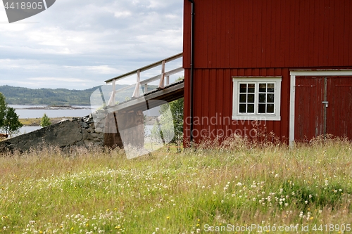 Image of Red barn with bridge