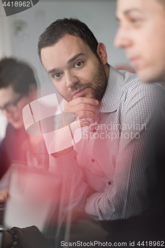 Image of Business Team At A Meeting at modern office building