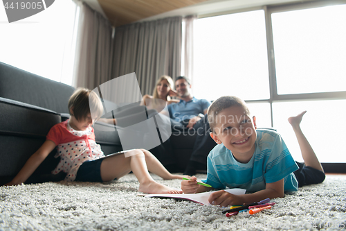 Image of young couple spending time with kids