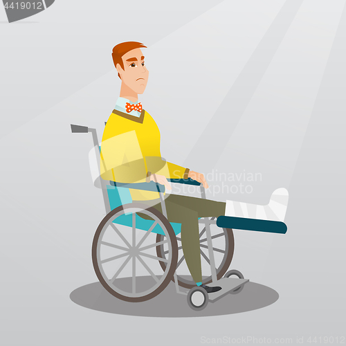 Image of Man with broken leg sitting in a wheelchair.