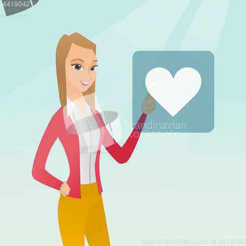 Image of Young woman pressing heart shaped button.