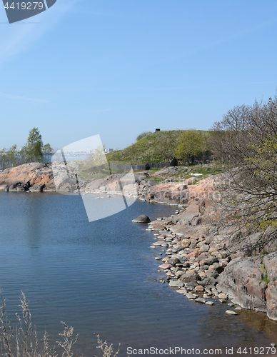 Image of Suomenlinna beach and rocky cove on a sunny day