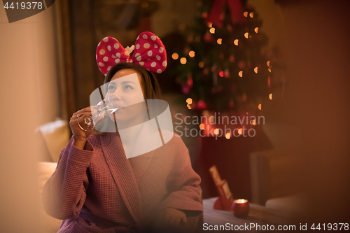 Image of woman drinking champagne at spa