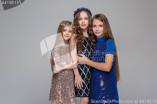 Image of Studio portrait of young attractive caucasian teen girls posing at studio