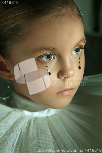 Image of The fashion portrait of young beautiful teen girl at studio