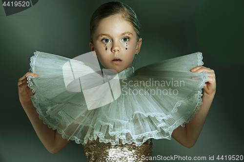 Image of The fashion portrait of young beautiful teen girl at studio