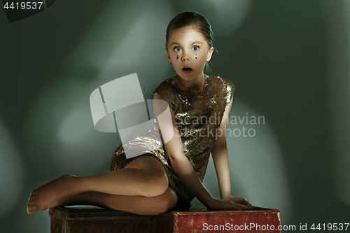 Image of The fashion portrait of young beautiful teen girl at studio