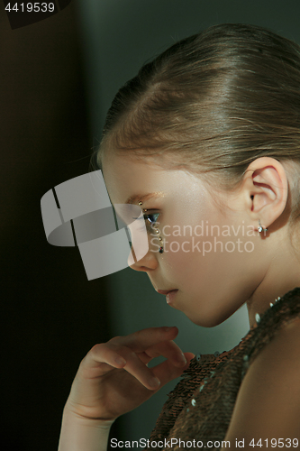 Image of The fashion portrait of young beautiful teen girl at studio