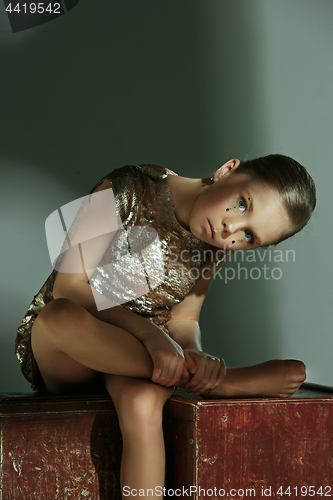 Image of The fashion portrait of young beautiful teen girl at studio