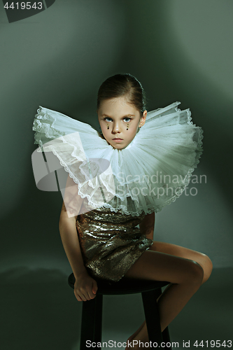 Image of The fashion portrait of young beautiful teen girl at studio